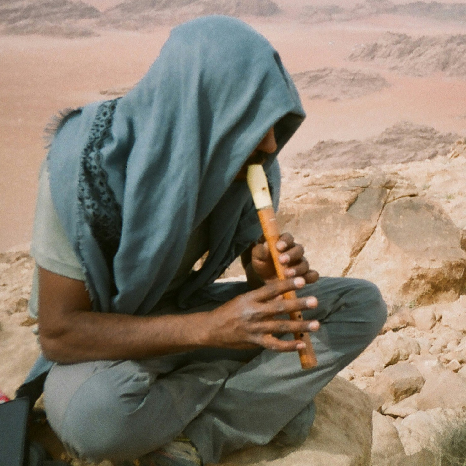 The Egyptian flute player in the desert artwork