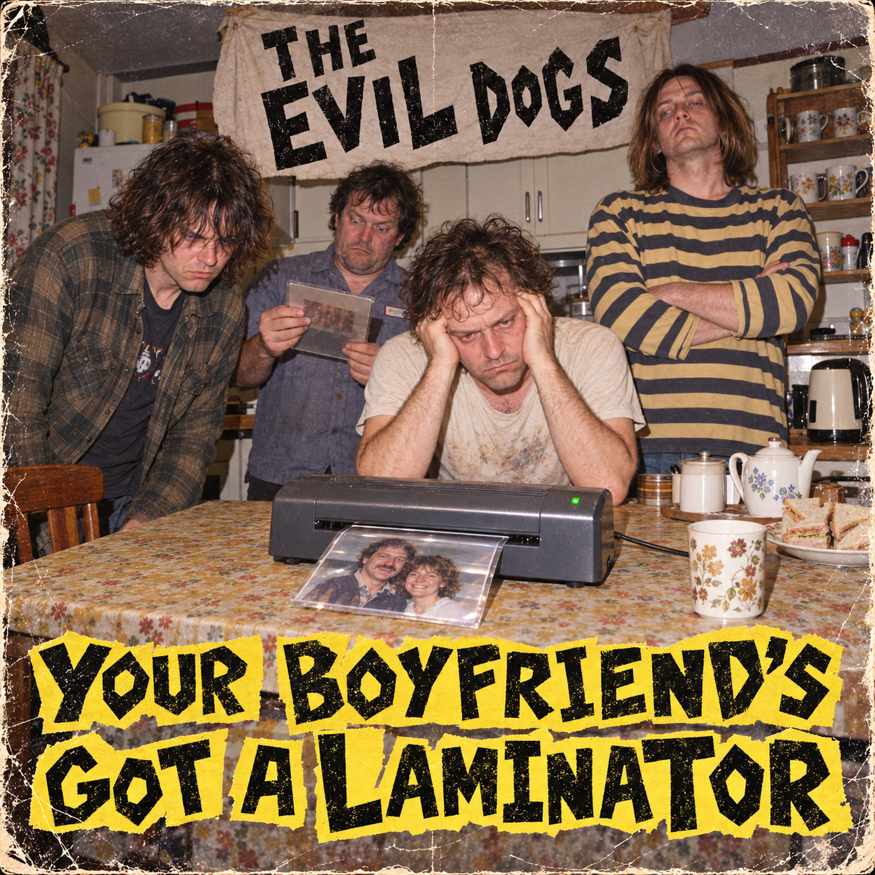 The Evil Dogs - Your Boyfriend’s Got a Laminator artwork