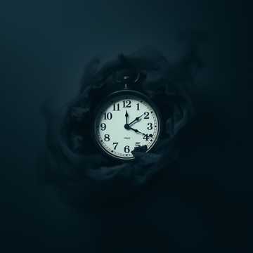 The Clock that Dreams in Ash