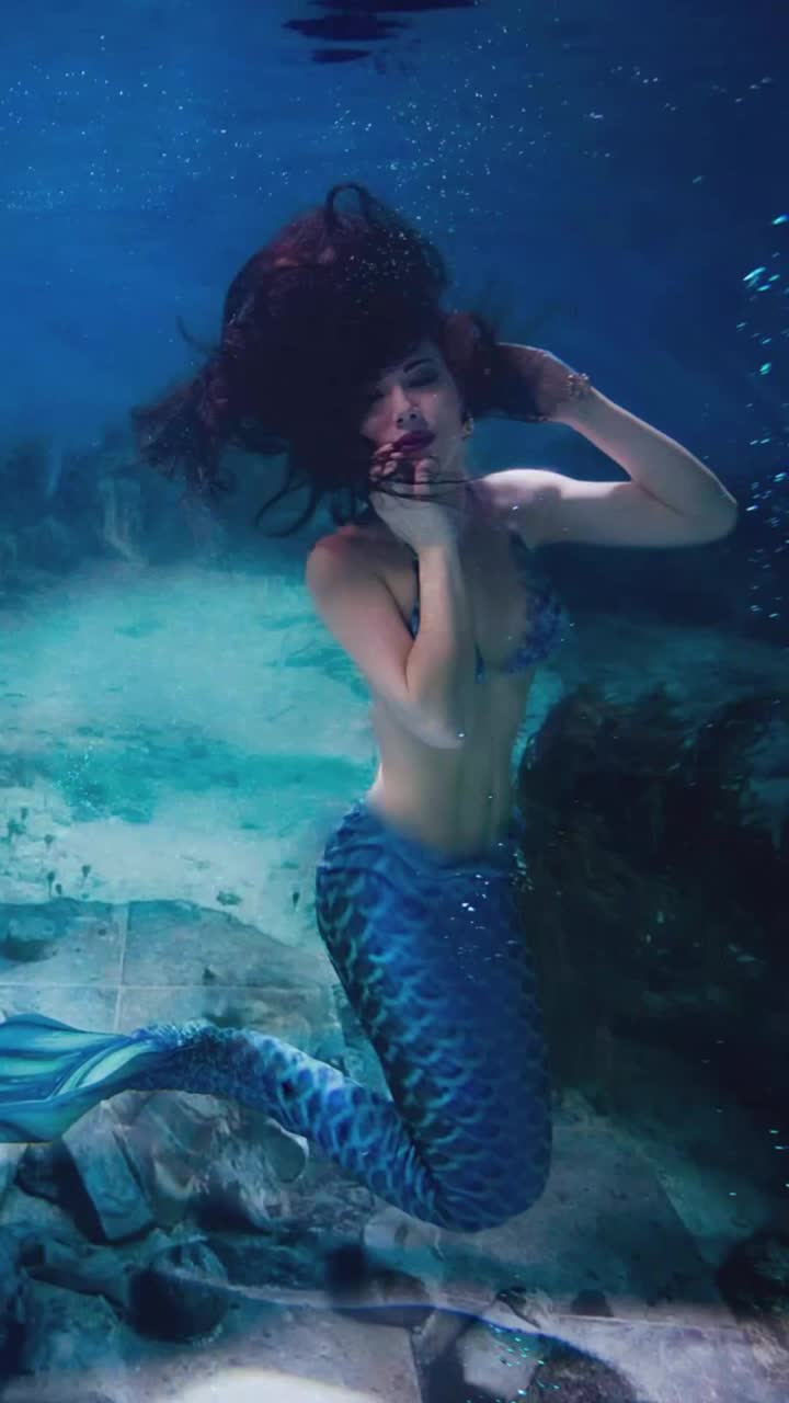 Dreaming beneath the waves with Mermaid and Dolphins artwork